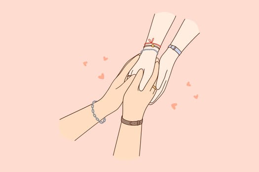 Togetherness, care, holding hands concept. Hands of loving caring people couple one in another meaning mutual love, tenderness and support illustration, close-up