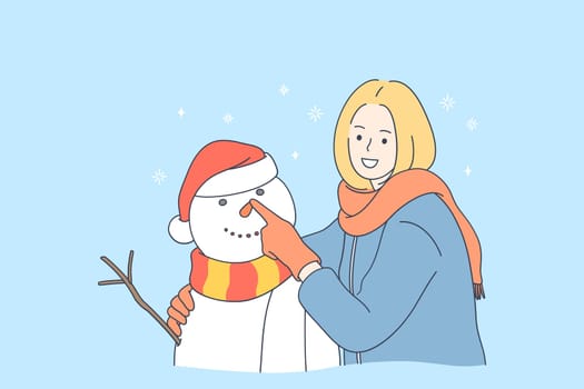 Enjoying winter and activities outdoors concept. Young smiling woman cartoon character making snowman and enjoying wintertime with snow outdoors vector illustration