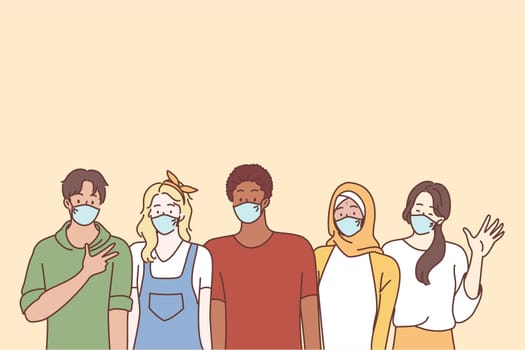 Coronavirus disease and multi ethnic youth friends concept. Group of young people teens students wearing face medical masks for preventing corona virus outbreak standing showing signs waving hands
