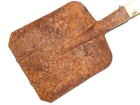 Old iron shovel for digging on a white background. Work tool. Agriculture. Farmer. Shovel with a wooden handle. Agricultural activities. Harvesting. Background image. Place for text.