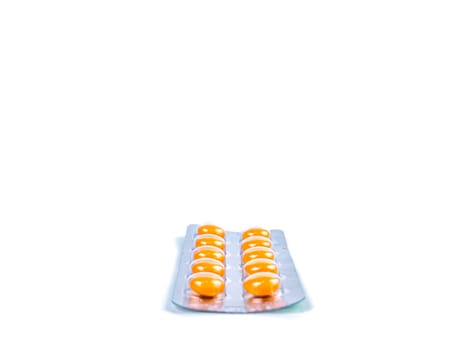 Medical medicine in pills on a white background. Pharmacy drugs in tablets. Pharmacology. Medical medicine in capsules. Pharmacy capsules for human treatment. Place for your text. Drugs in pills.