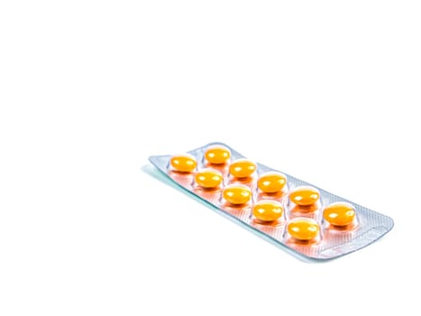 Medical medicine in pills on a white background. Pharmacy drugs in tablets. Pharmacology. Medical medicine in capsules. Pharmacy capsules for human treatment. Place for your text. Drugs in pills.
