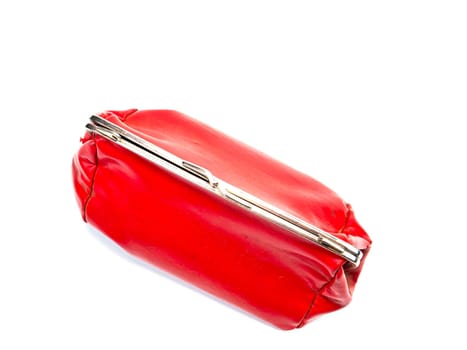 Red female cosmetic bag on a white background. Handbag. Women's cosmetic bag. Beauty and fashion. Background image. place for text.