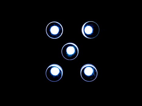 White led electric bulbs glow in the dark. Led light bulbs at night. Night illumination. Electric light. Black background. Background image. Place for text. Technology. Poster.