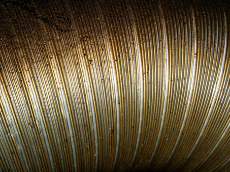 Aluminum corrugation of industrial air ventilation system. Aluminum corrugation. Industrial air ventilation system. Air duct pipeline. Background image. Industry. Texture. Place for text.