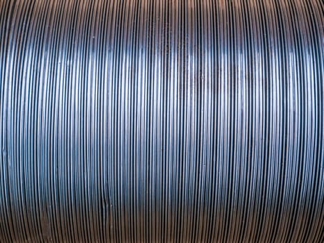 The texture of the metal corrugated ventilation pipe. Metal corrugation texture. Ventilation pipe. Hood. Embossed metal. Iron. Air conditioning duct. Intake hood air duct. Background.