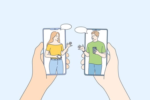 Video conference during COVID-19 concept. Screens of smartphones with people talking from home remotely concept, man and woman teammate using smartphone or mobile phone for distant meeting