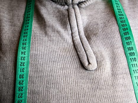 A centimeter is a tailor's tool for measuring when sewing. A centimeter is a tool for measuring dimensions. A meter for sewing clothes. Tailoring for the tailor. Measurement of sizes.