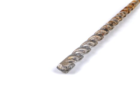 Metal drill for drilling holes on a white background. Metal drill. Drilling holes. Worker tool. Construction and repair. Builder tool. Iron material. Workshop equipment. Handicraft equipment. Master.