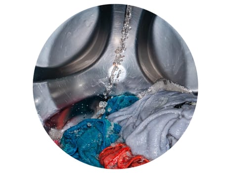 Rotating drum in a washing machine tub with clothes. Washer. Automatic laundry. Service and repair of equipment. Splashing water. Repair shop. Stainless steel tank. Centrafuga.