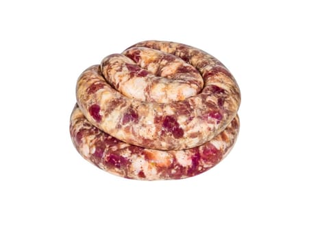 Ring of homemade meat sausage on a white plate. Pork meat. Raw pork sausage. Pig intestine. Greasy sausages. High-calorie food. Not vegetarian food. Menu of dishes. Home kitchen.