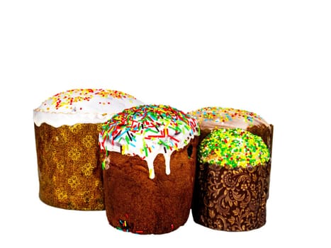 Easter bread with colored glaze on a white background. Easter bread artos. Orthodox Church. Religious tradition. Religious Christian holiday. Dough baked goods. Festive food. Resurrection.