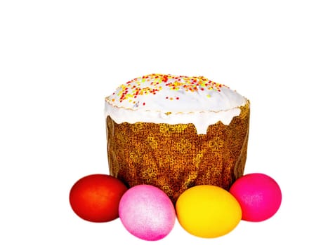 Easter bread and colored eggs on a white background. Easter eggs. Orthodox Church. Religious tradition. Religious Christian holiday. Dough baked goods. Festive food. Resurrection.