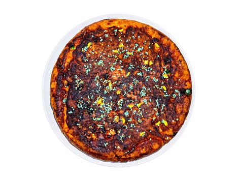 Round dough pie decorated with colored pastry sprinkles. Dough cake. Sweet dessert. Homemade baking. Pastry. Sweet food. White background. Dinner plate. Background image.