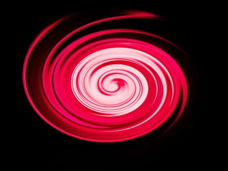 Red abstract spiral on a black background. Space. Cosmic spiral. Fantastic theme. Red circle on a black background. Illustration. Template for text. Poster. Background image. Billboard.