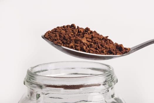 Instant Coffee over bright background