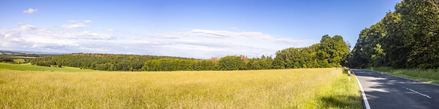 Idyllic panorama from farmland and meadows in hesse germany