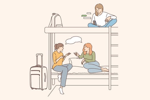 Hostel for young people concept. Positive girls friends cartoon characters sitting sharing one room in hostel or hotel chatting communicating together vector illustration