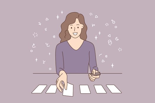 Playing cards and individual prognosis concept. Beautiful smiling young woman cartoon character sitting laying out cards on table over grey background vector illustration