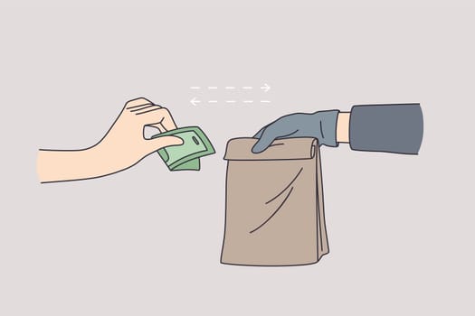 Delivery during coronavirus epidemic concept. Couriers hand in latex gloves holding paper bag with food and female hand in latex gloves giving money delivery service in pandemic time
