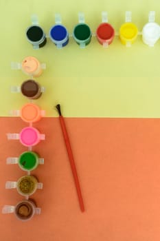 Colors art background. Watercolor paints and paintbrush. knolling concept.