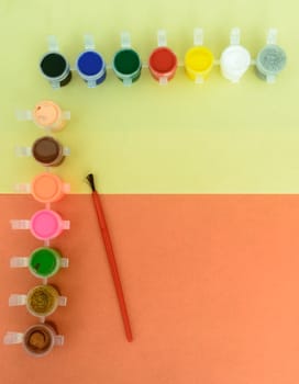 Colors art background. Watercolor paints and paintbrush. knolling concept.