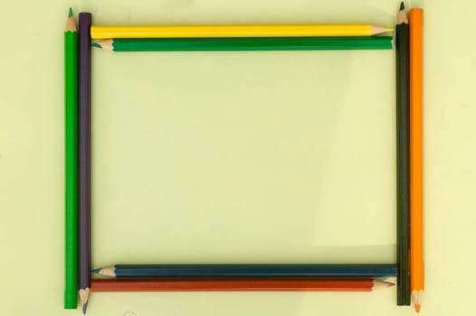 Color pencil background photography. Multi colored pencil image backgrounds. Copy Space