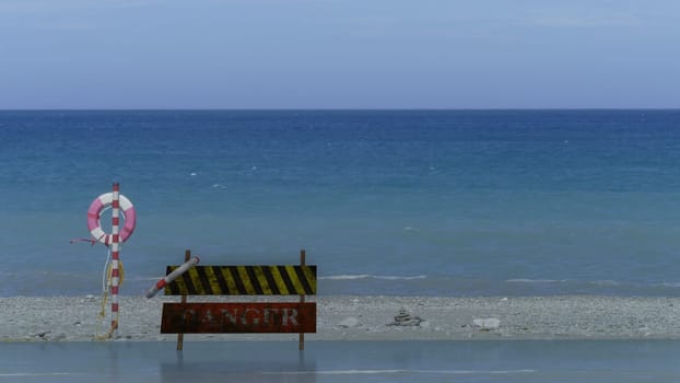 The Lifebuoy on an empty sandy beach by Baltic sea in Lithuania. Minimalist landscape