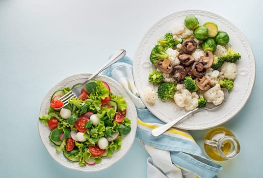 Healthy salad meals with cooked vegetable and fresh lettuce salad. Healthy vegetable diet meal.