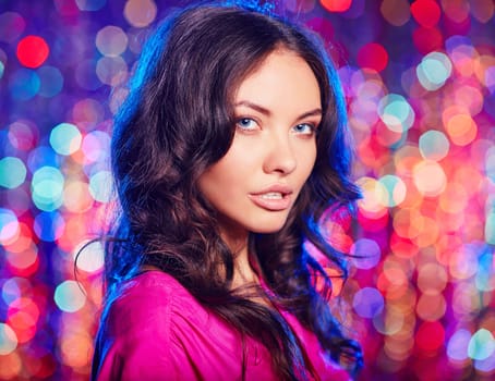 Portrait of a beautiful brunette looking at camera
