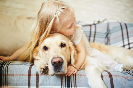 Cute child resting with dog