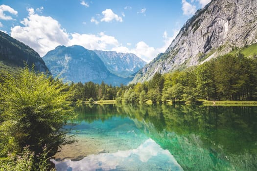 Mountain lake with mountain silhouette in background, Bluntautal, summer time