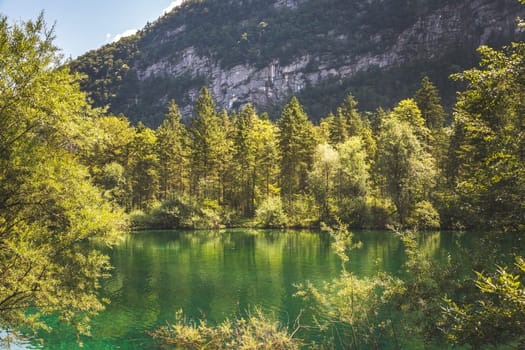 Mountain lake with mountain silhouette in background, Bluntautal, summer time