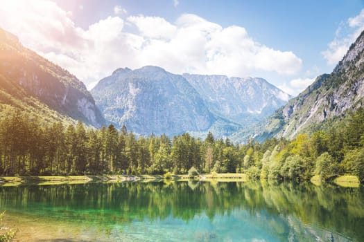 Mountain lake with mountain silhouette in background, Bluntautal, summer time