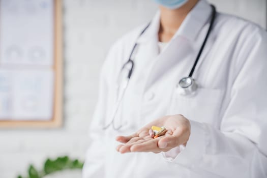 medical pills on doctor hand