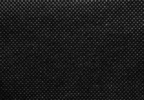 Black nonwoven or spunbond fabric texture background