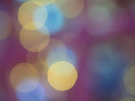 Blurry colorful Christmas bokeh lights festive background