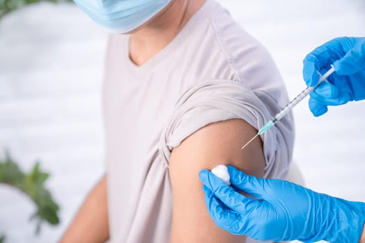 close up on people shoulder getting vaccinated