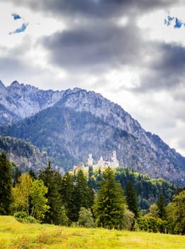 View of the Neuschwanstein Castle and the surrounding mountains in Bavaria