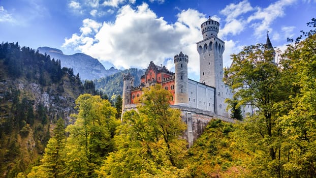 View of the Neuschwanstein Castle and the surrounding mountains in Bavaria