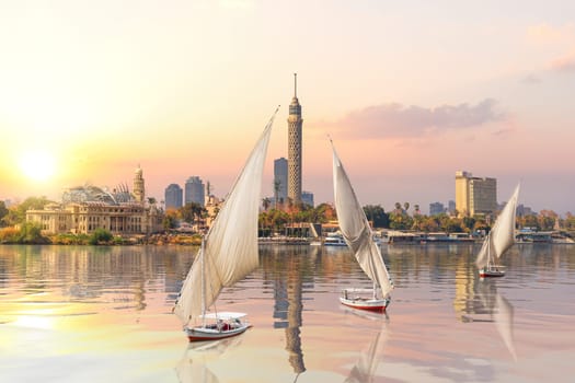Sunset on the Nile and sailboats, Cairo, Egypt.