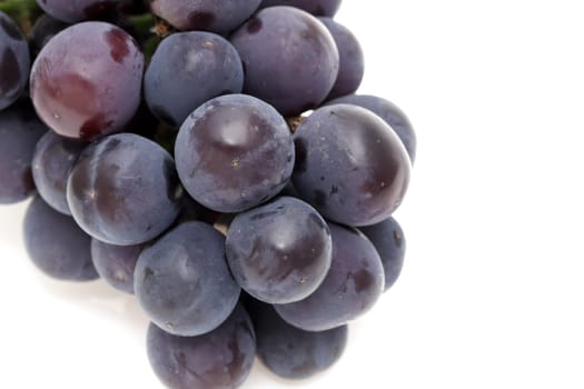 bunch of ripe purple grapes isolated on white background