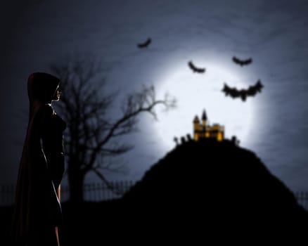 3D render of a female in cloak against a defocussed Halloween background