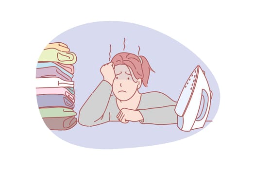Housewife, work load, ironing concept. Young depressed house wife has many work to do. Frustrated woman is work loaded with ironing sitting in front of iron and pile of clothes. Simple flat vector