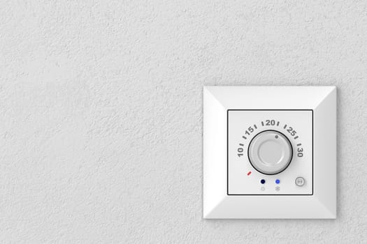 Air conditioner control panel (thermostat) on a gray wall