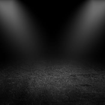 3D render of spotlights shining down into a grunge interior