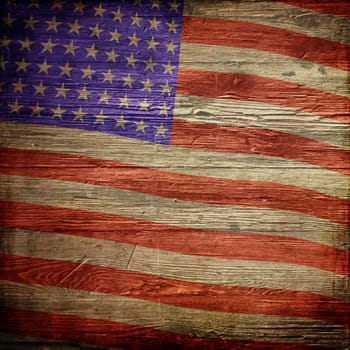 4th July Independence Day background with American flag on grunge wooden texture
