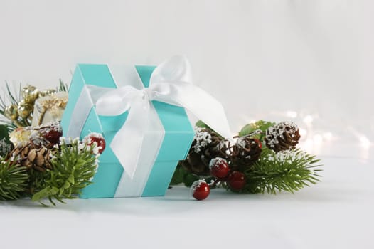 Blue Christmas gift on a white background