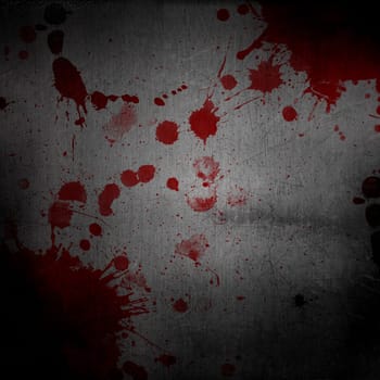 Blood splatters on a scratched grunge metal background