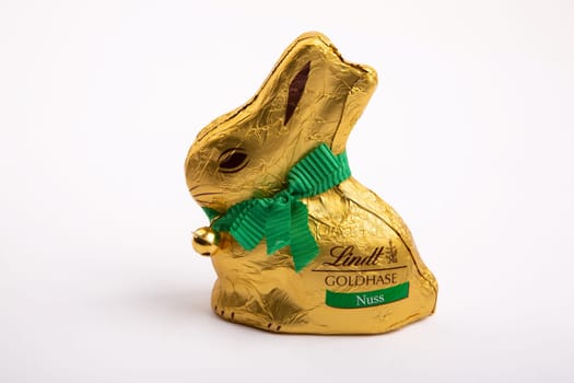 HUETTENBERG, GERMANY, 2021-04-04: Lindt Gold Bunny. Dressed in gold, with a ribbon and golden bell that rings, it is the traditional Lindt Easter chocolate.